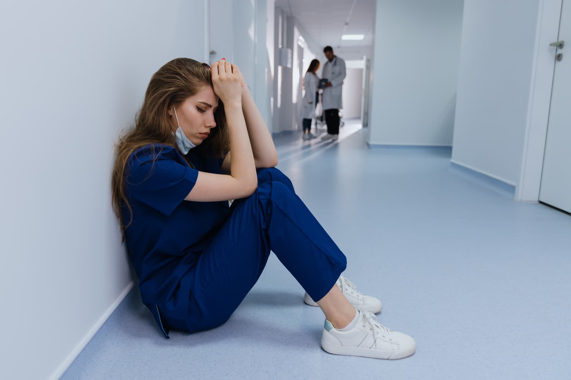 Fatigued doctor resting during a break between emergency department shifts