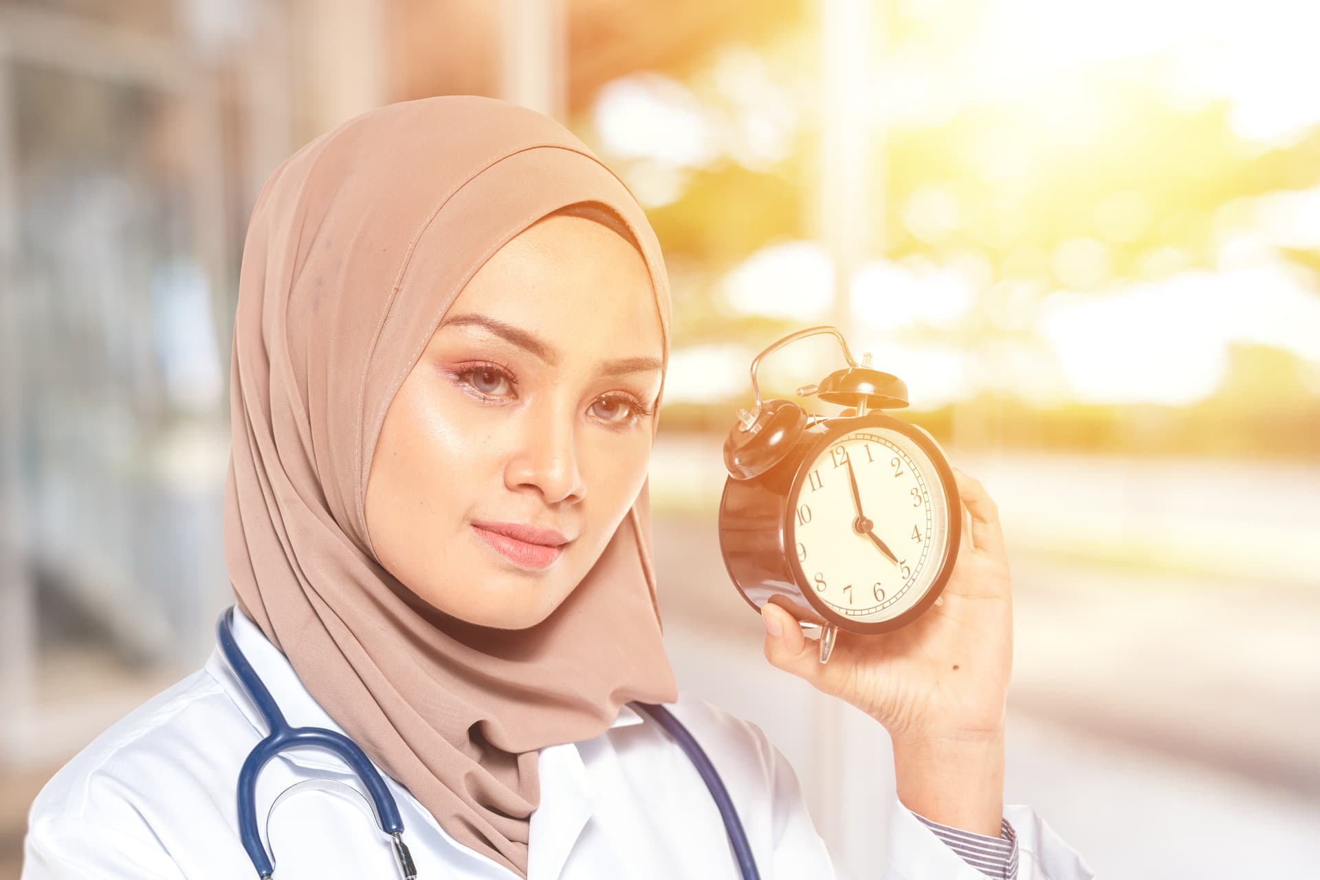 Hospital clock at night representing the circadian challenges of emergency medicine shift work