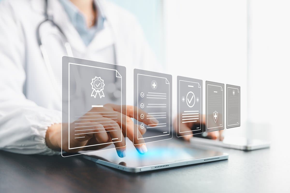Practice manager reviewing complex healthcare staff roster on a digital display