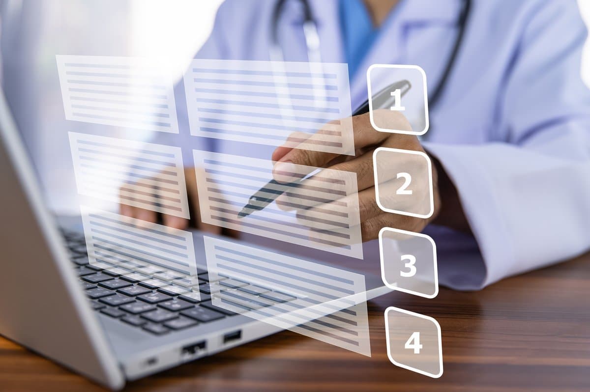 Healthcare professionals collaborating on staff scheduling in a modern medical facility