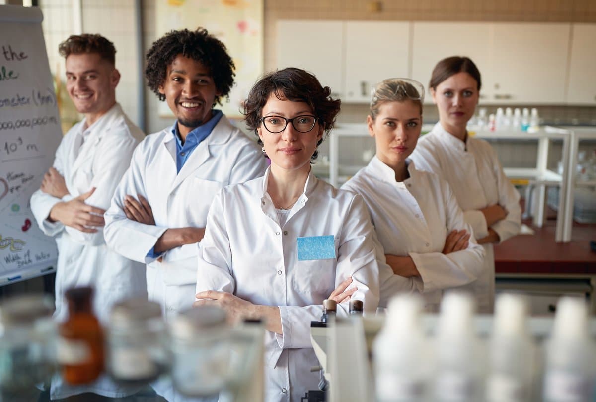 Confident pathology laboratory team in a modern diagnostic facility