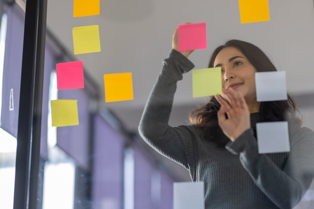 Colour-coded priority categories organised on a planning board representing constraint classification