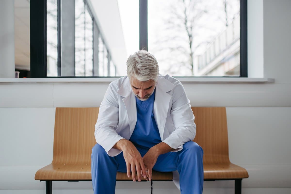 Healthcare worker experiencing unfair workload distribution and scheduling burnout
